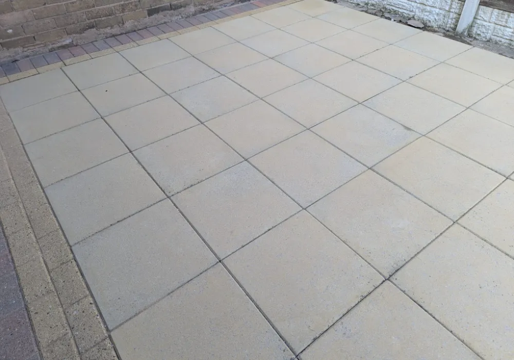 Light grey patio slabs after cleaning